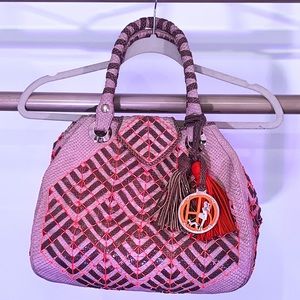 Henri Bendel coral and snake leather purse